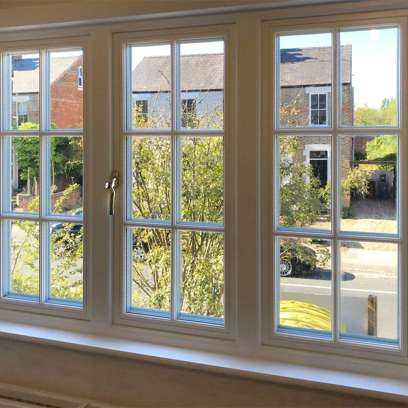 Flush casement timber window in painted white finish