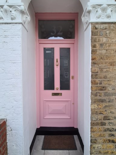 Pink painted front door in London
